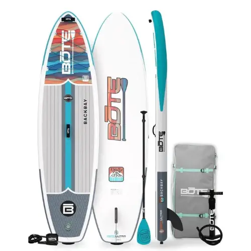 A white and blue surfboard with the word Bote on it.